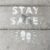 white and black love print on gray concrete floor